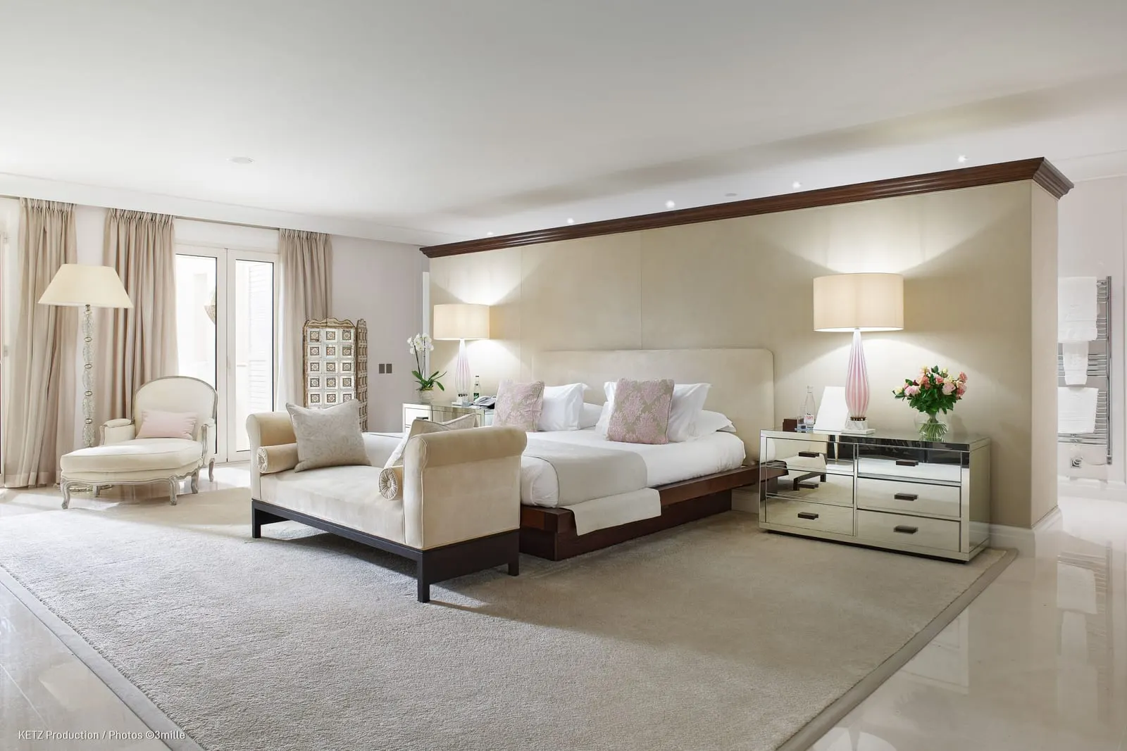 Ambassador Suite 122 at Cap Estel: the bedroom with a chaise longue at the foot of the bed
