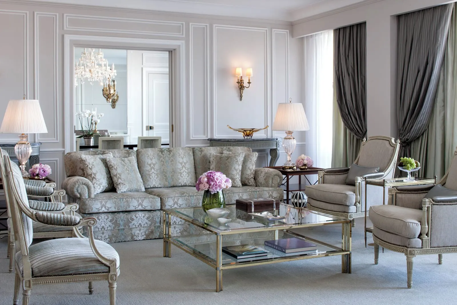 Royal Suite at Four Seasons Ritz Lisbon: the living room, with classic sofas and armchairs around a glass table