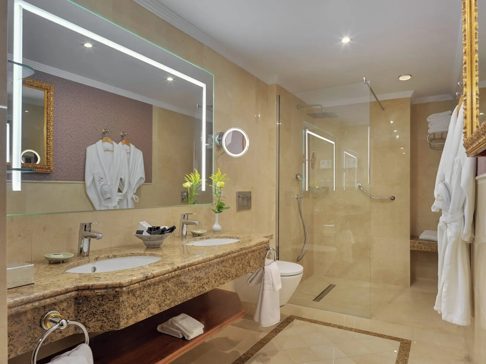 Superior Deluxe Teide View at Hotel Botánico: the bathroom, twin basins under a lit mirror and a walk-in shower