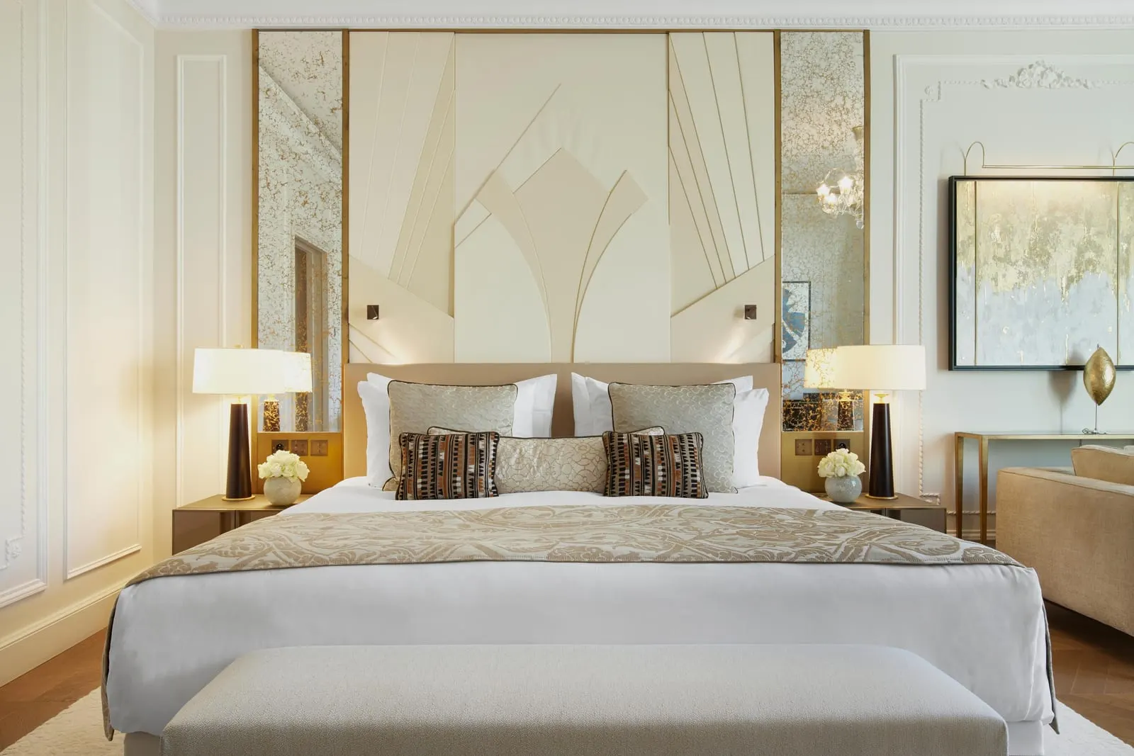Deluxe Room at Hôtel de Paris Monte-Carlo: the bed against a fan-shaped headboard, with lamps on both bedside tables