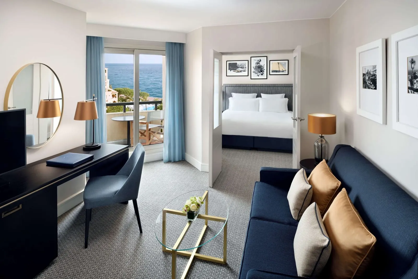Top Floor Suite at Columbus Hotel Monte-Carlo: the living room, with the bedroom through a doorway and a terrace facing the sea