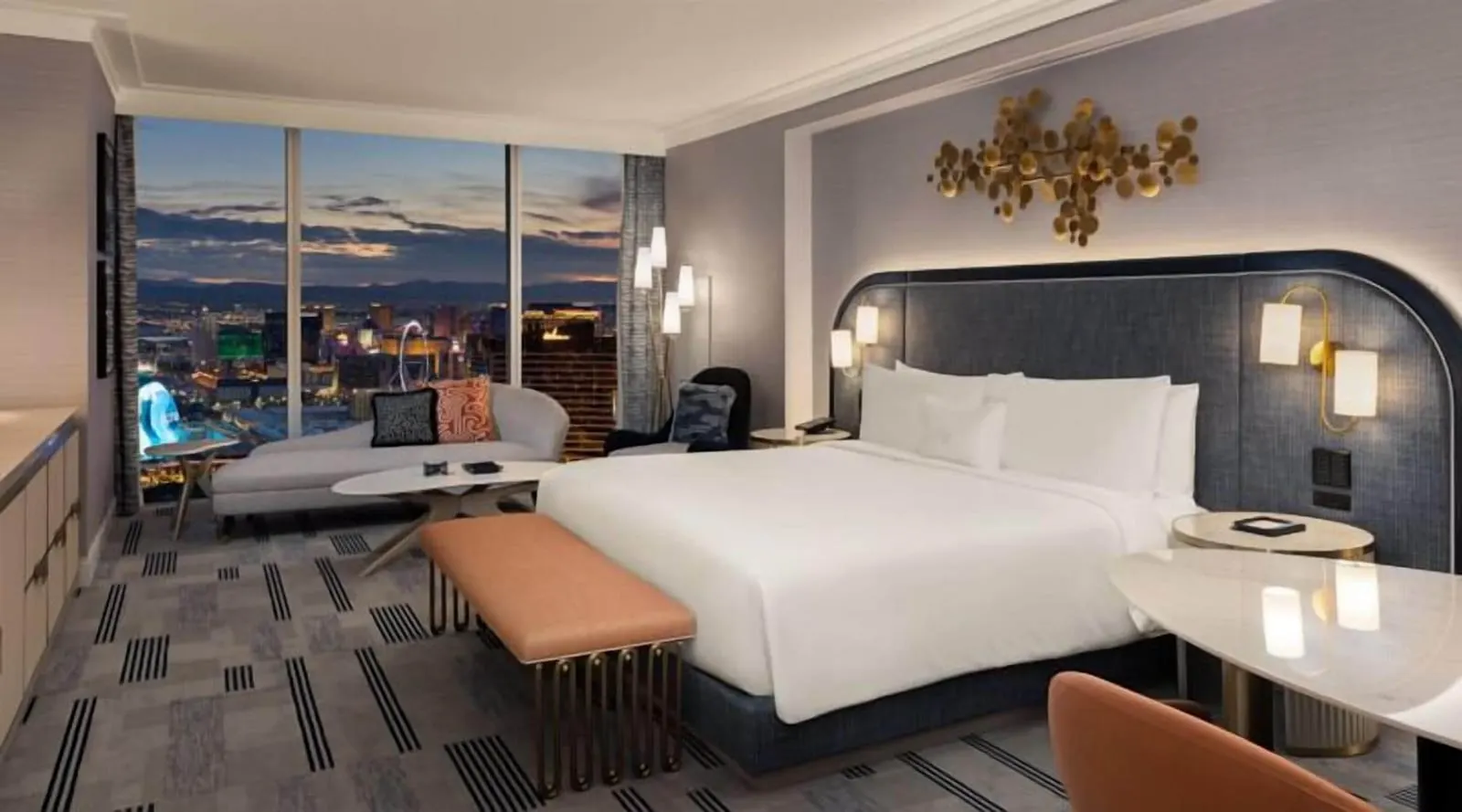 Fontainebleau Las Vegas: A Gold King room facing the Strip at dusk