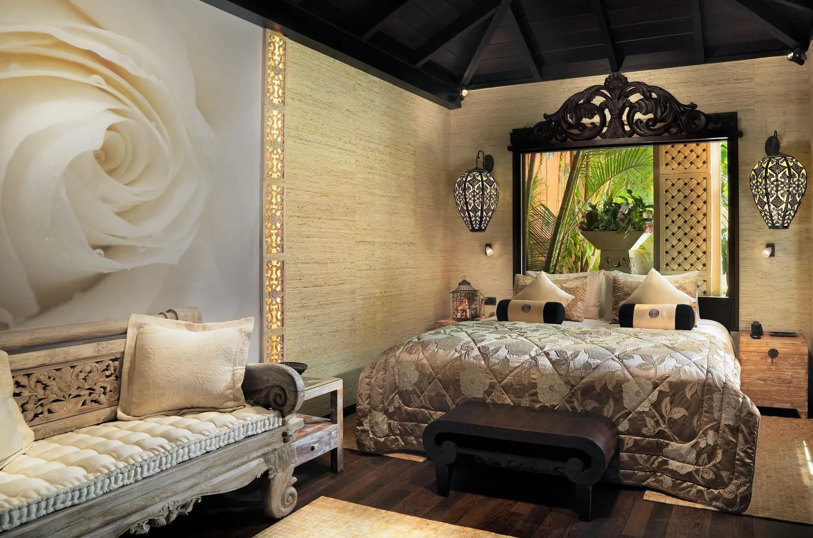 Queen Villa at Royal Garden Villas: a bed with a carved mirror headboard, a daybed and a large rose mural