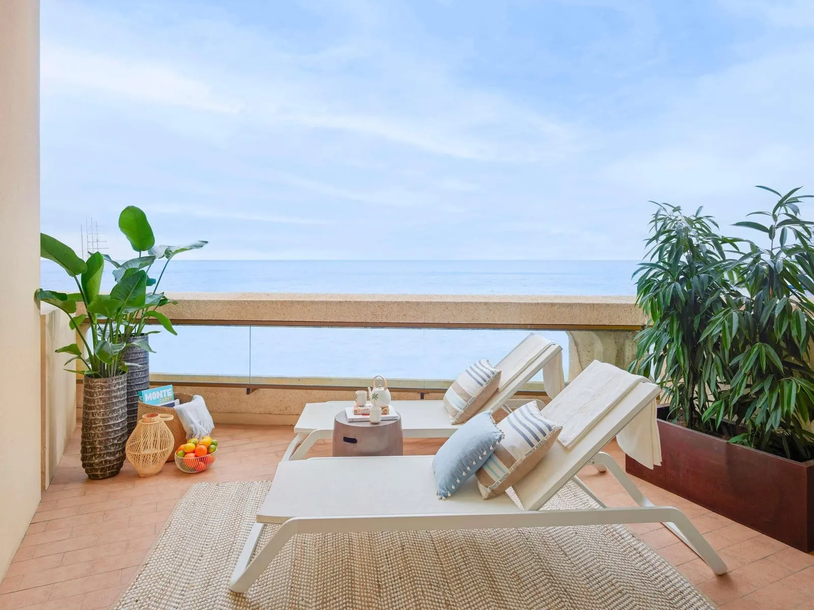 Signature Sea View room at Fairmont Monte Carlo: two loungers on the terrace facing the sea