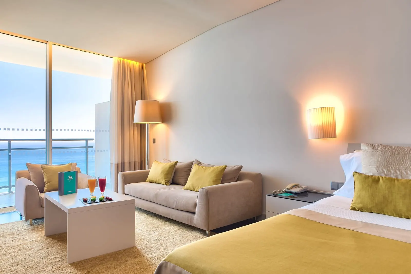 VidaMar Resort Hotel Madeira: A sea-view room with a sofa by the window