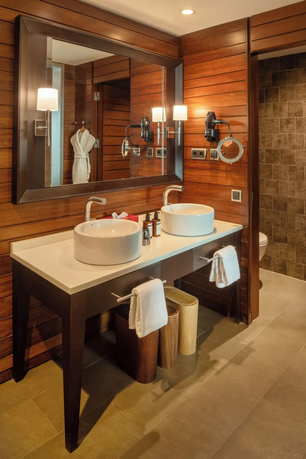Double Deluxe Superior at Salobre Hotel Resort & Serenity: a wood-panelled bathroom with two bowl basins on a white counter under a wide mirror