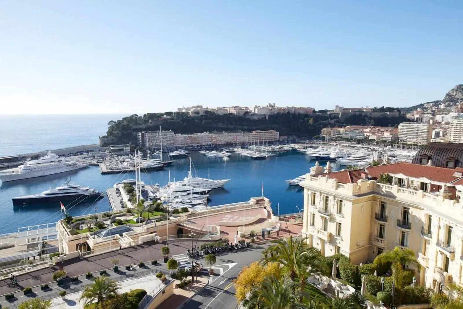 Exclusive Room with sea view and terrace at Hôtel de Paris Monte-Carlo: the view over Port Hercule and its yachts to the Rock