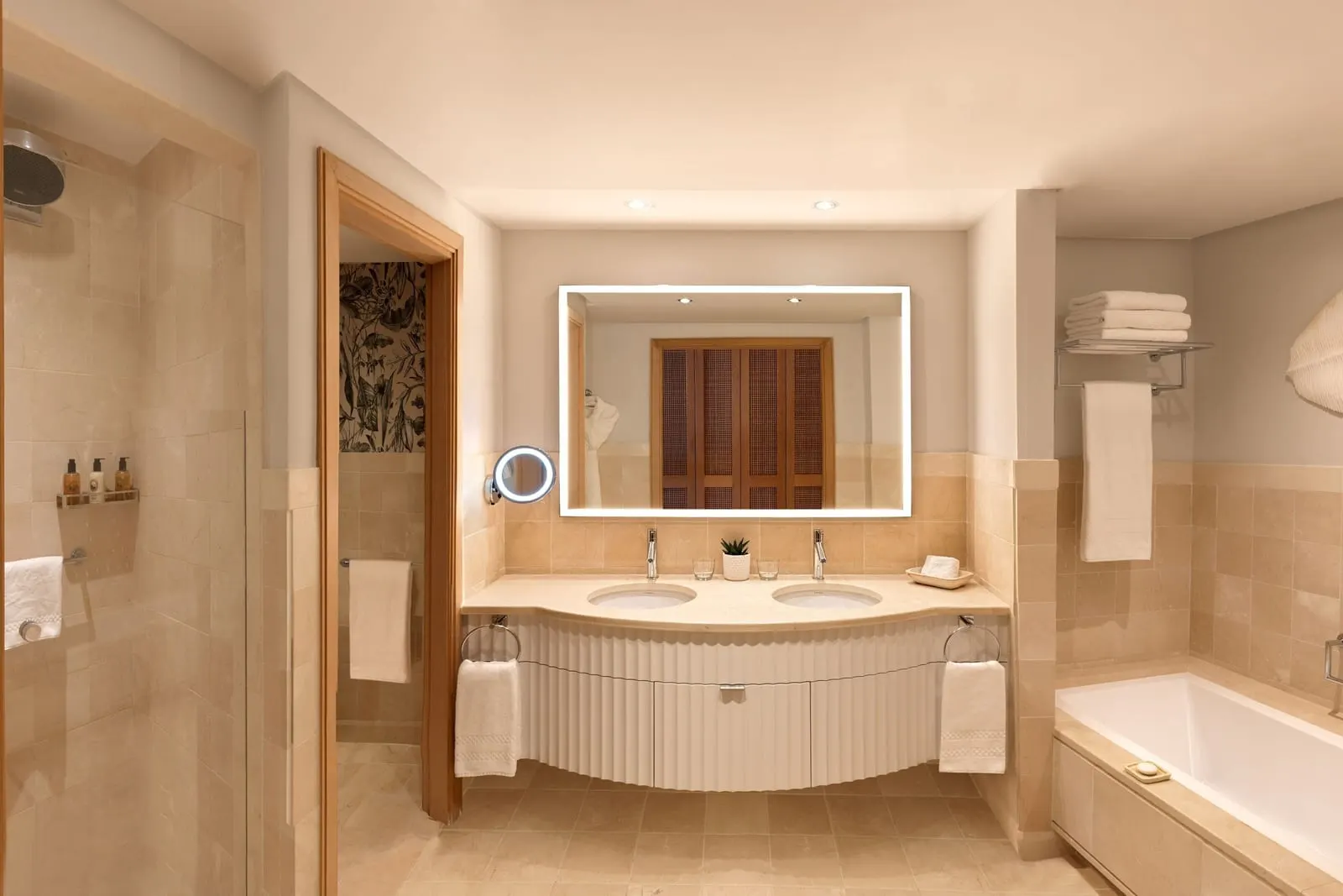 Retreat Deluxe Room Ocean View at the Ritz-Carlton Abama: the bathroom, with twin basins, a bath and a walk-in shower