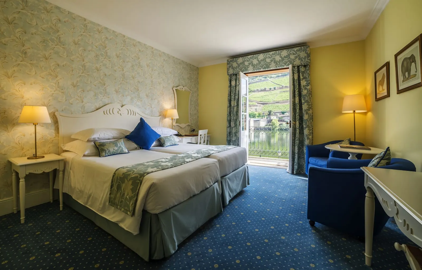 Classic Room with a View of the River Douro at The Vintage House: twin beds, blue armchairs and an open balcony door