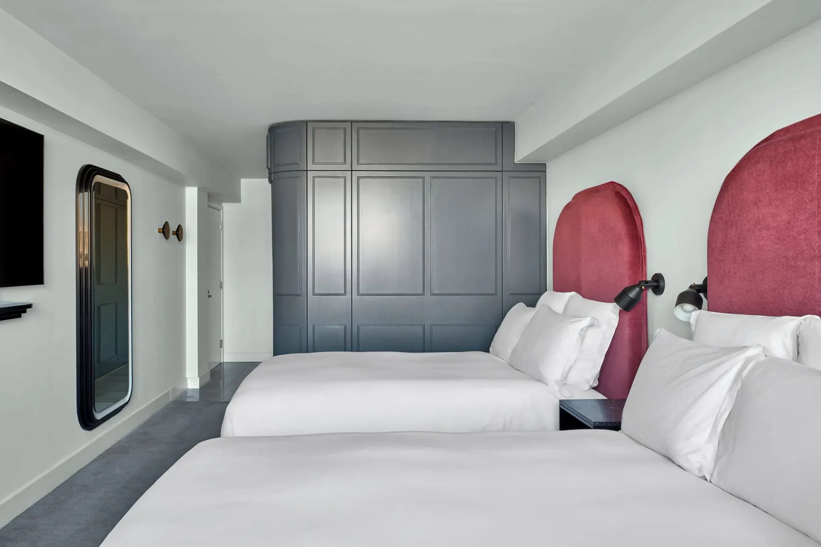 Superior Double Double at Sea Containers London: two double beds with red headboards and a grey panelled wardrobe