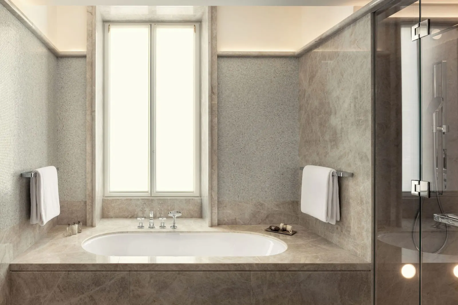 Premium Room bathroom at Bvlgari Hotel Roma: a bathtub set in grey marble under a tall window