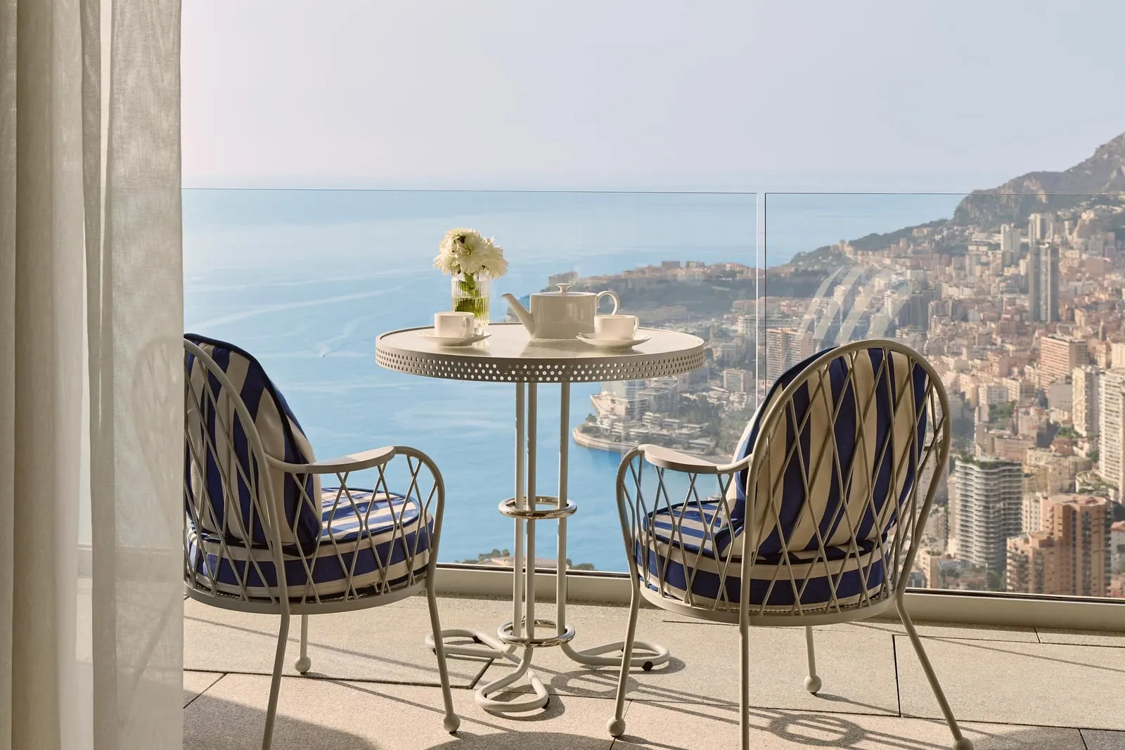 Panoramic Sea View Studio at The Maybourne Riviera: a table for two on the terrace above Monaco and the sea