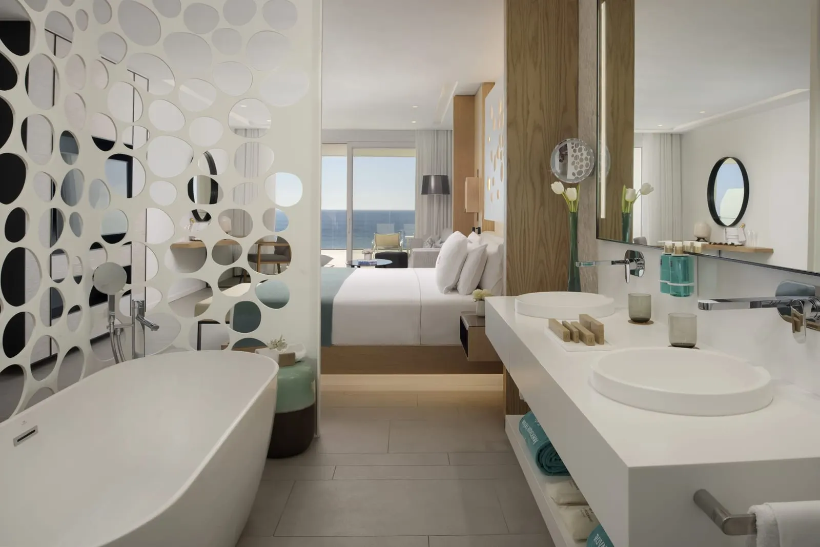 Junior Suite Sea Front Panoramic View at Royal Hideaway Corales Beach: freestanding bath and twin basins open to the bedroom