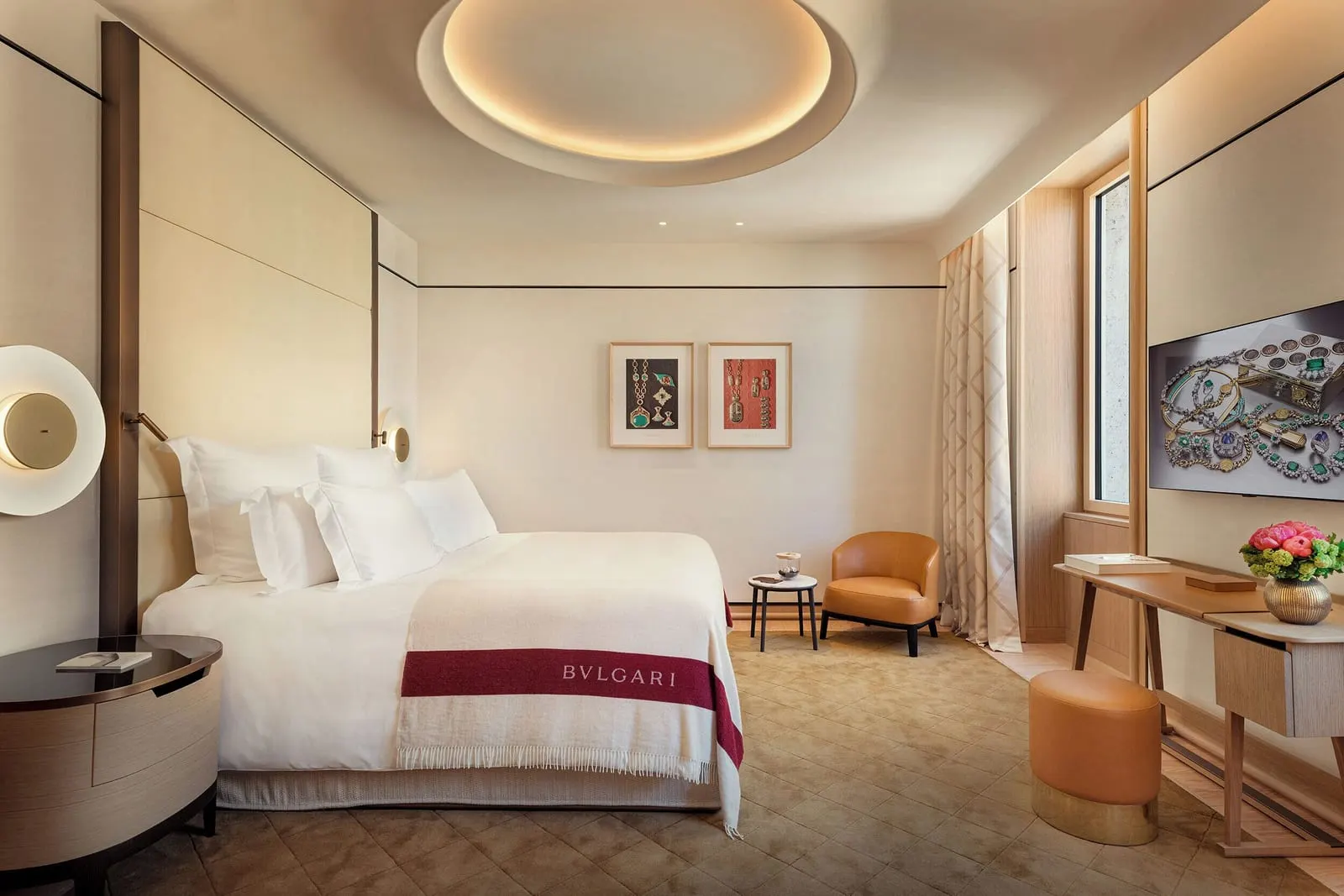 Superior Room at Bvlgari Hotel Roma: a double bed with a branded throw, an armchair and a desk by the window