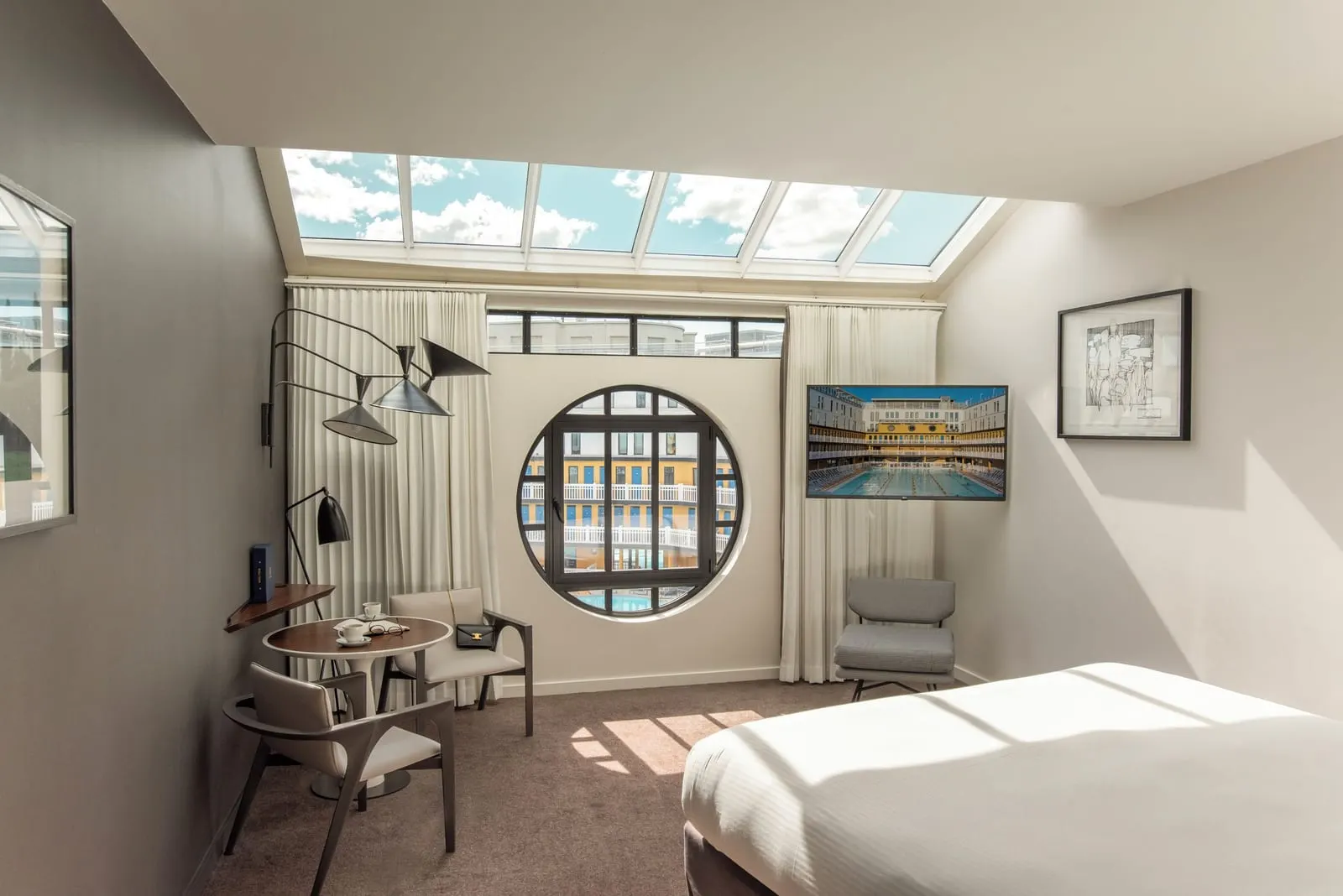 Hôtel Molitor Paris: An Executive Room with a porthole onto the pool