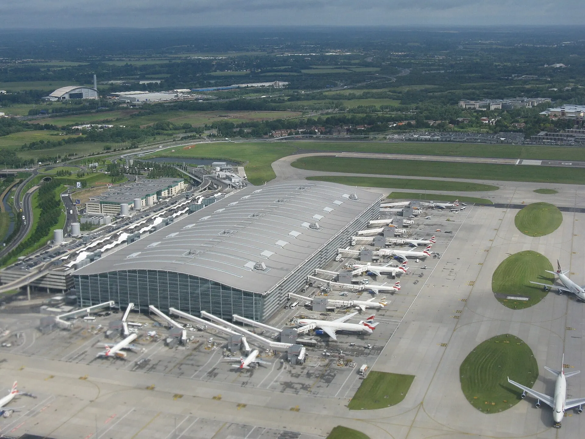Heathrow Terminal 5 and its satellite concourses seen from the air