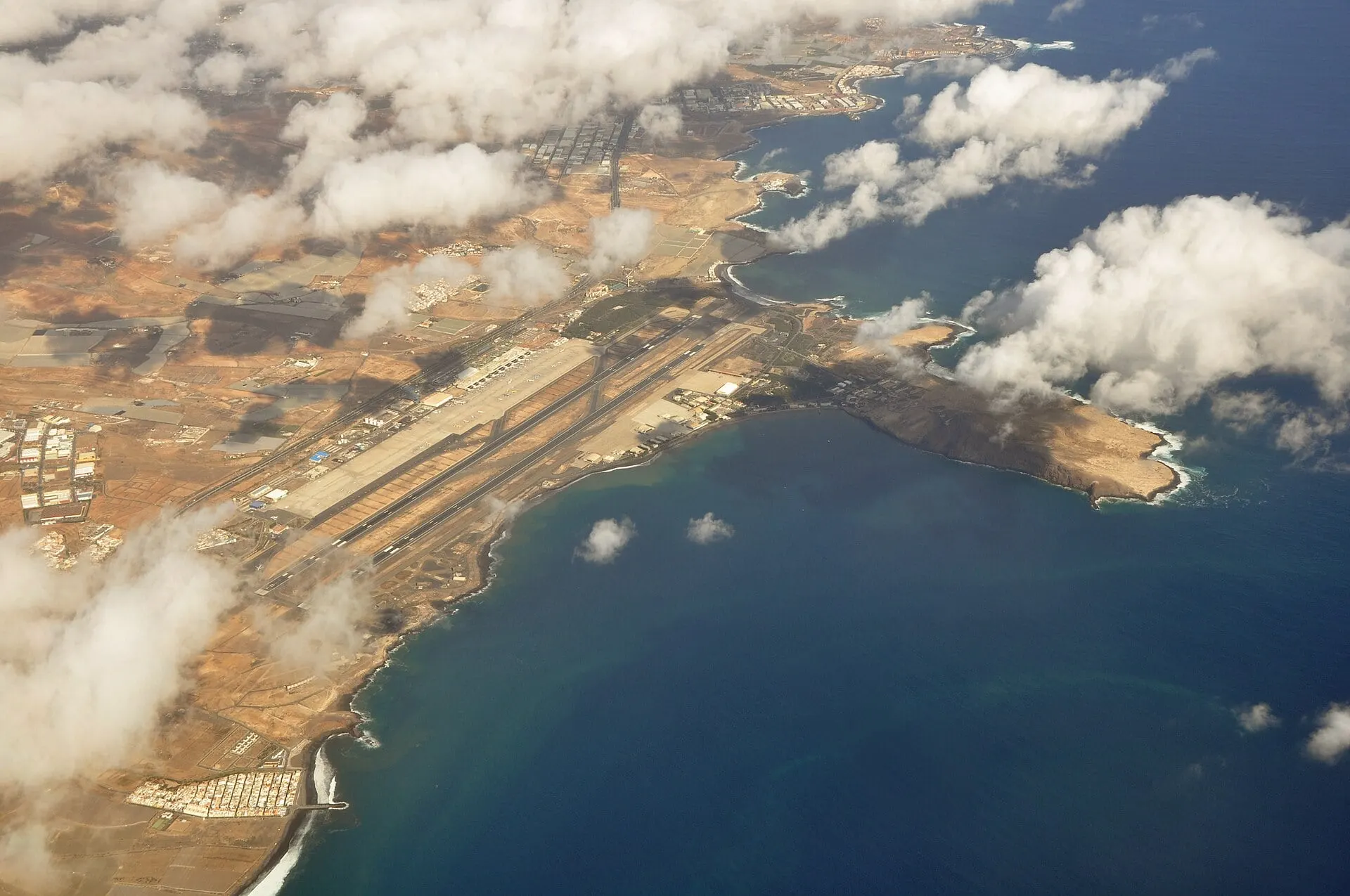 Gran Canaria Airport from the air, with its runways along the east coast of the island