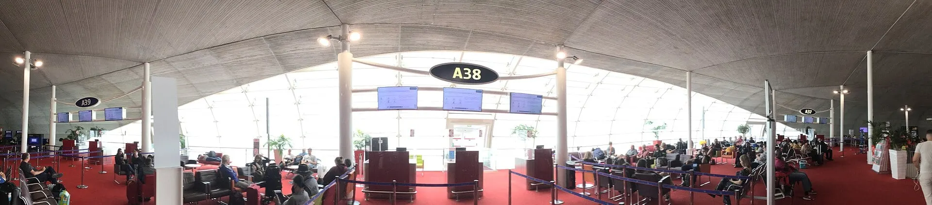 Gate A38 in Terminal 2A at Paris Charles de Gaulle, with seating by the boarding desks
