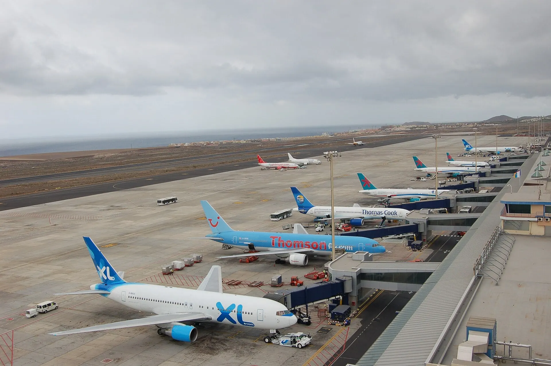 Aircraft lined up at the boarding piers at Tenerife South Airport