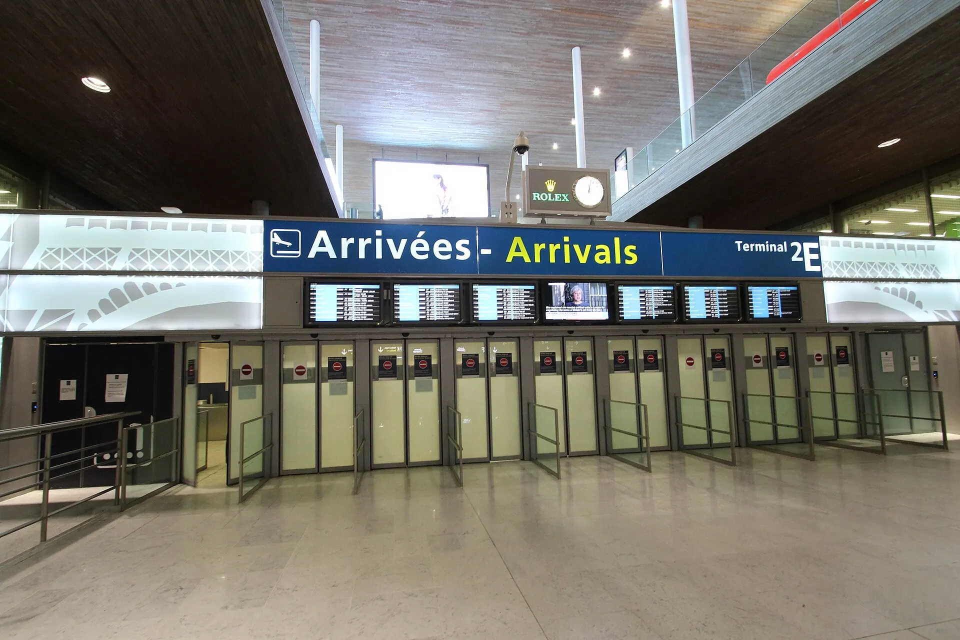 The arrivals hall exit doors in Terminal 2E at Paris Charles de Gaulle