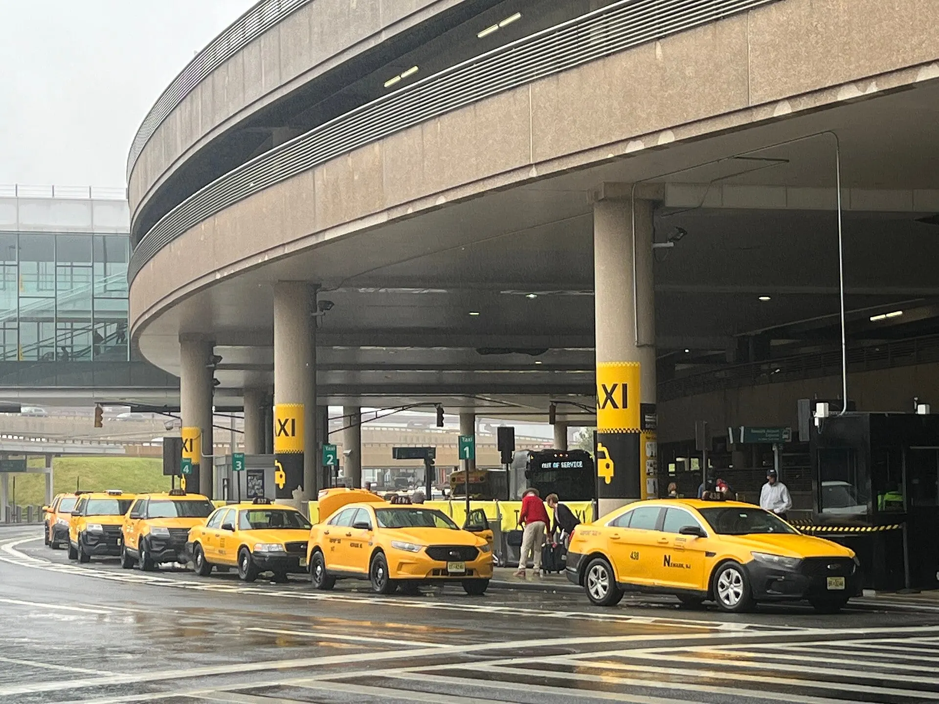Yellow cabs waiting at the taxi rank at Newark Liberty International Airport