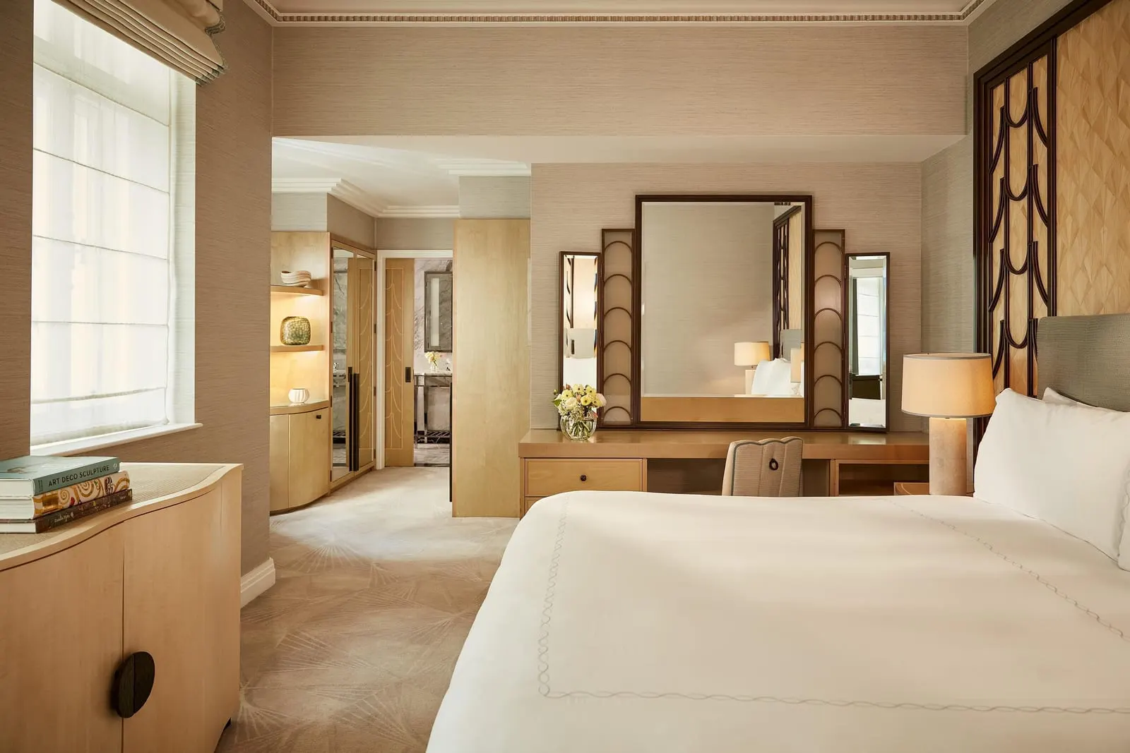 Deluxe Junior Suite at Claridge's: the bed and a dressing table with a tall mirror