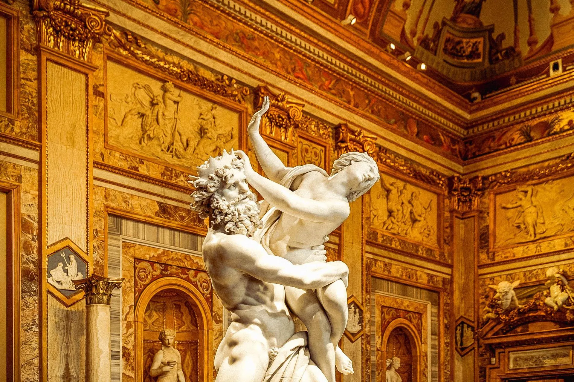 Bernini's Rape of Proserpina in a gilded room of the Borghese Gallery