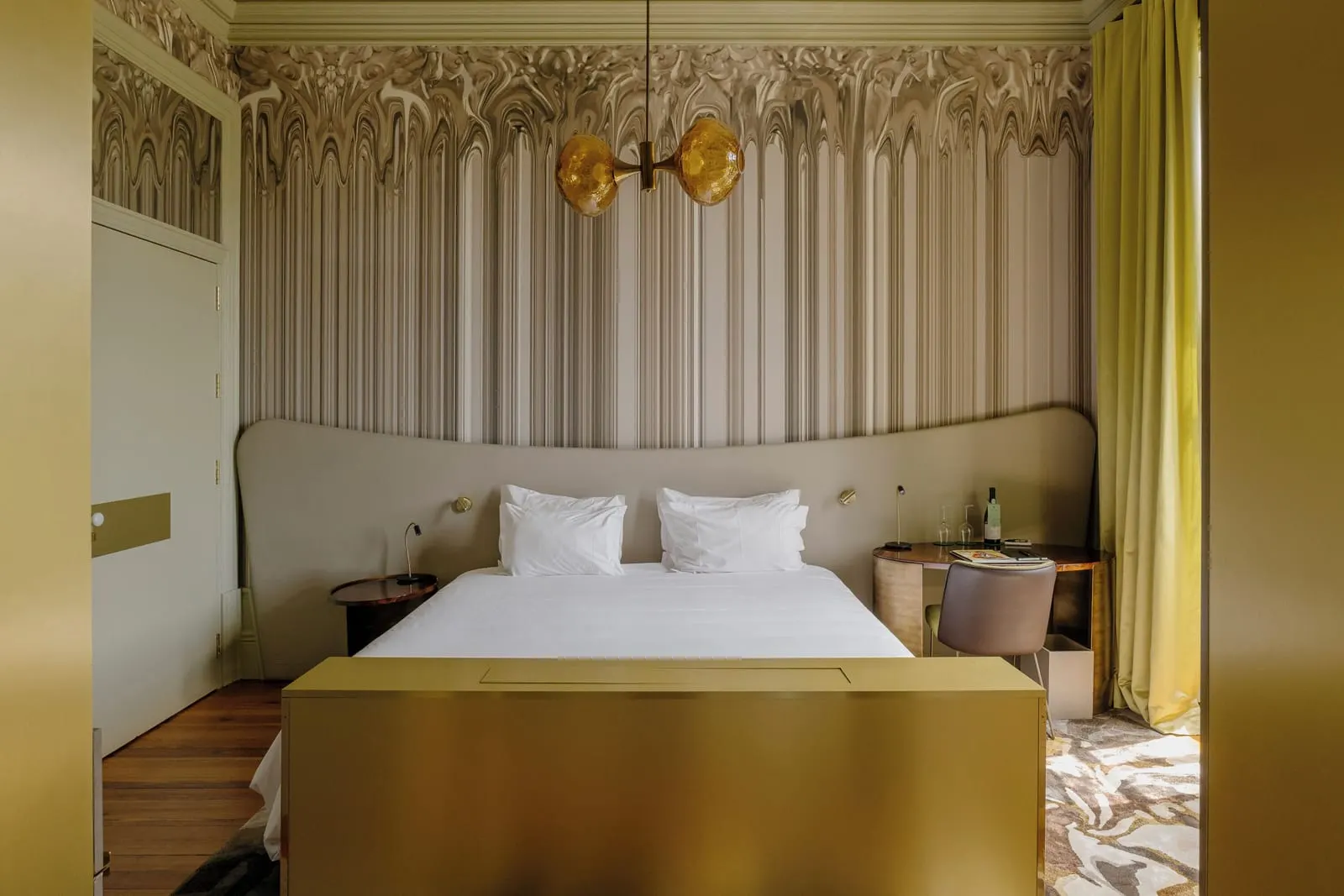 Manor House Room at Vila Foz: the double bed, striped wallpaper, a desk and gold curtains