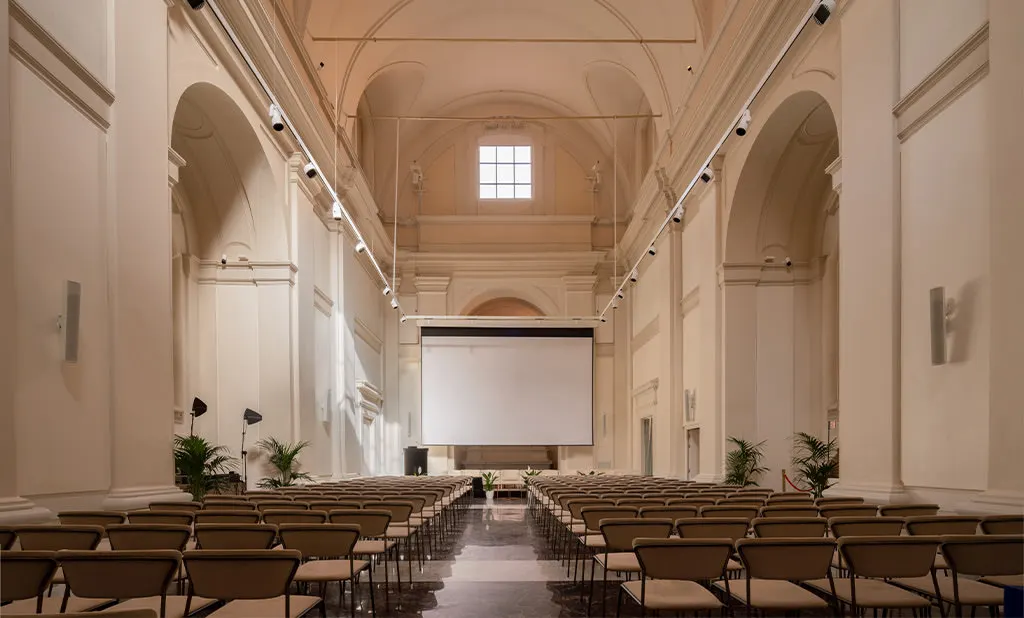 Salone Bernini at Palazzo Ripetta, the vaulted white hall with rows of chairs where the Candlelight concerts are held