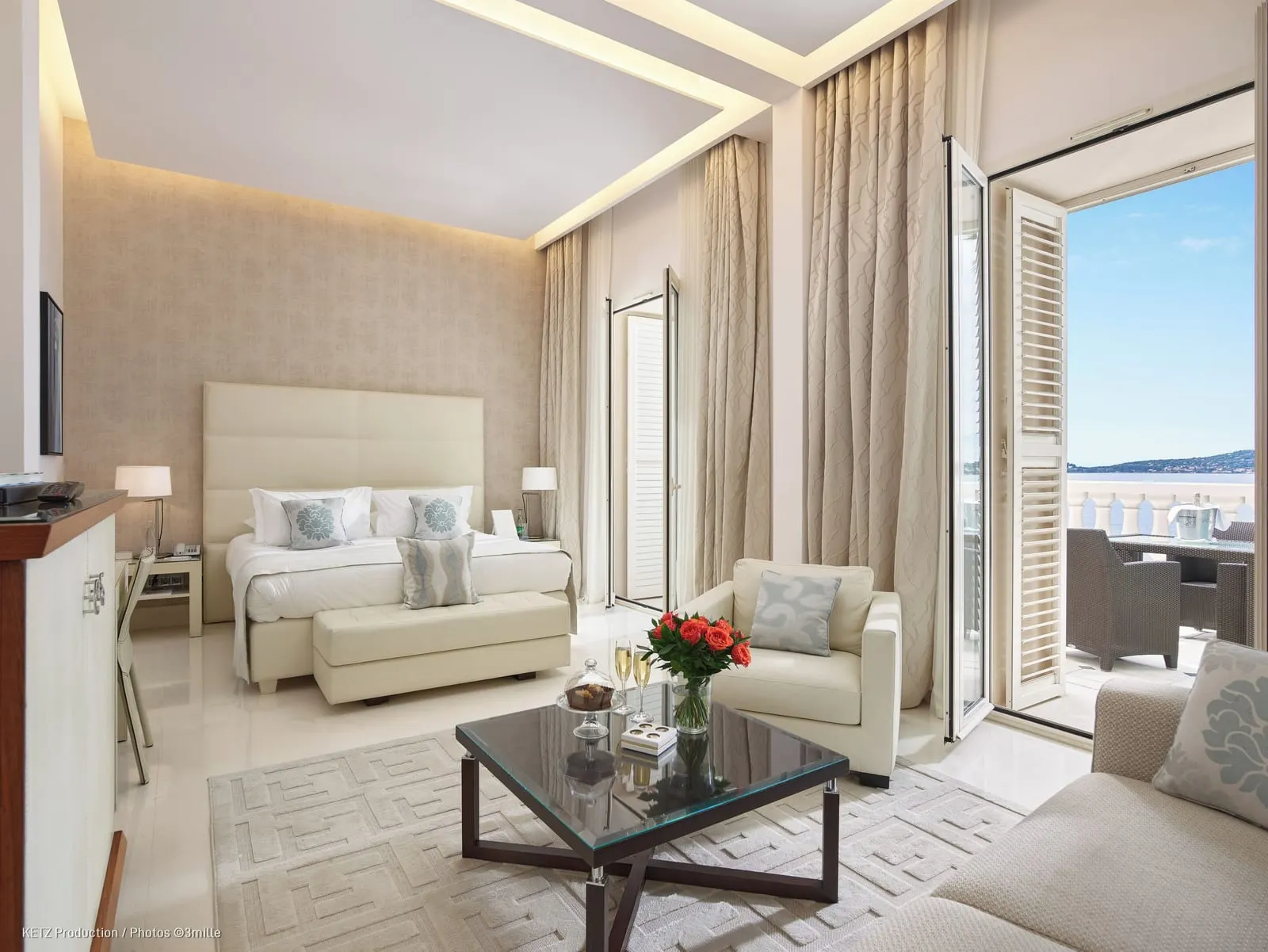 Junior Suite 222 or 223 at Cap Estel: the bed, a sitting area and French windows open to the terrace