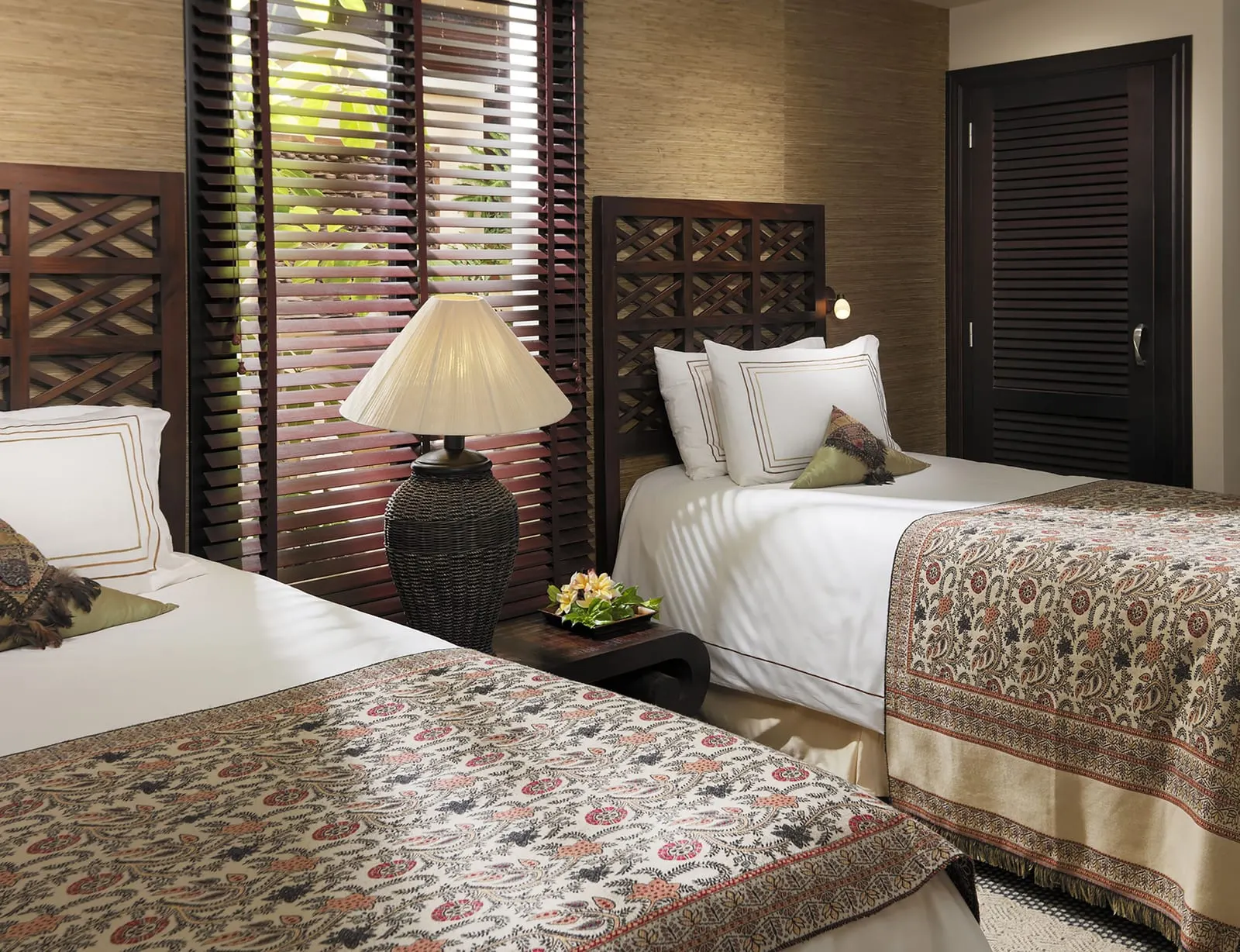 Gran Princess Villa at Royal Garden Villas: a twin bedroom with patterned bedspreads and slatted shutters