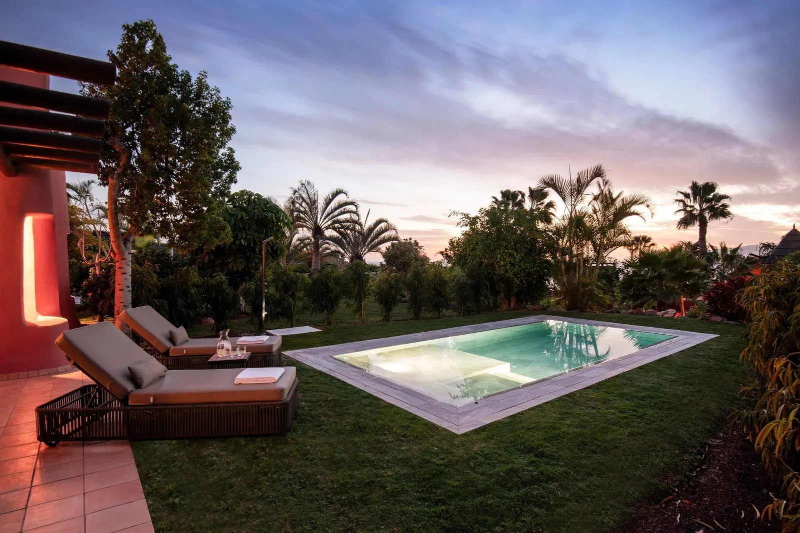 Adults-only Retreat Suite One Bedroom with Private Pool at the Ritz-Carlton Abama: the pool and loungers at dusk