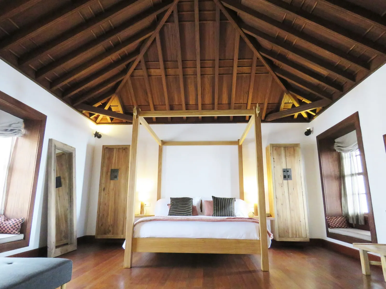 Suite 09 at Hotel Boutique Palacio Ico: a four-poster bed under a tall pitched wooden ceiling