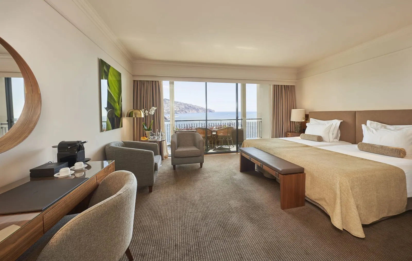 The Cliff Bay: A sea-view room opening onto its balcony