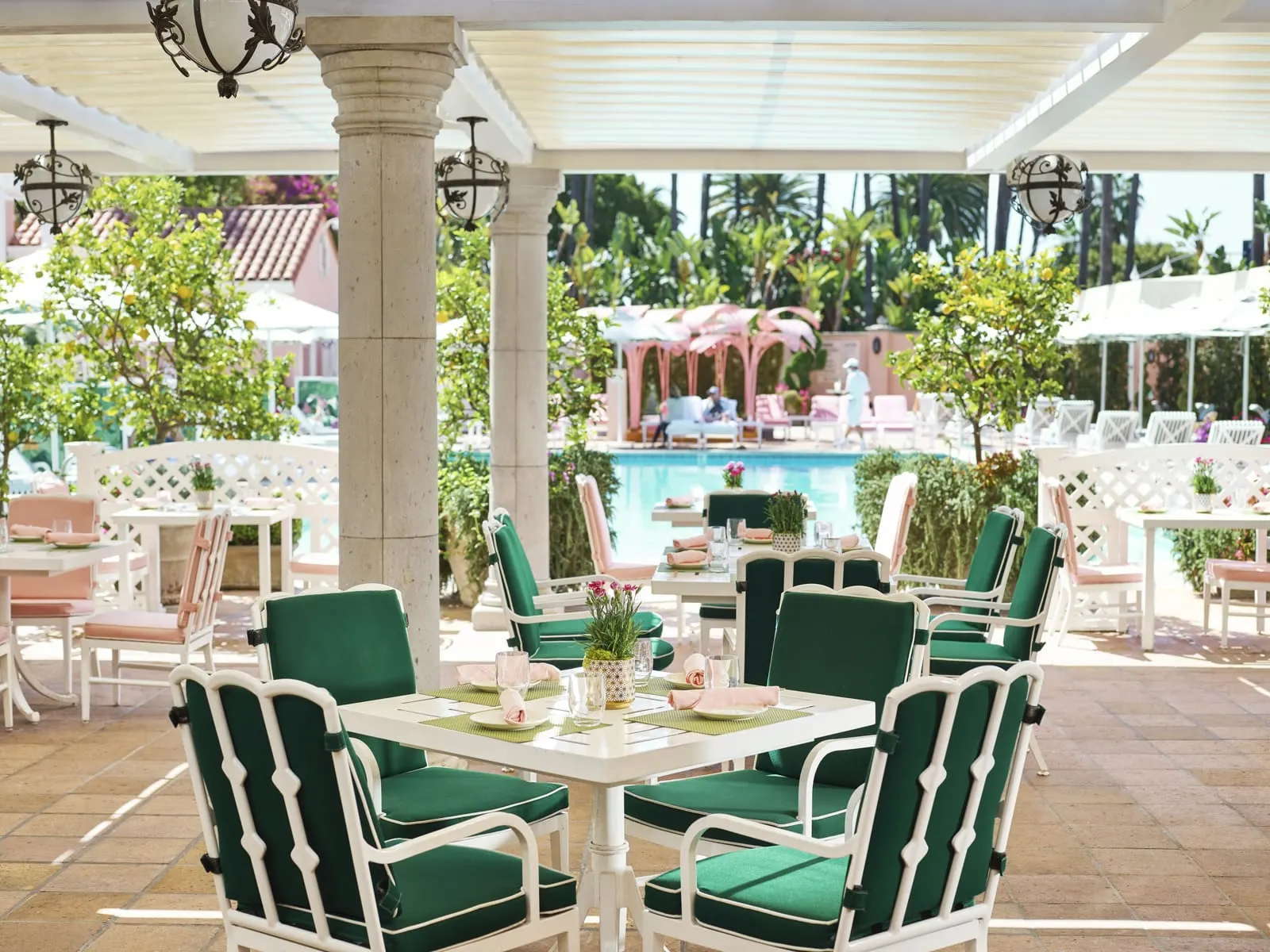 The Beverly Hills Hotel: Poolside tables beside the pink cabanas