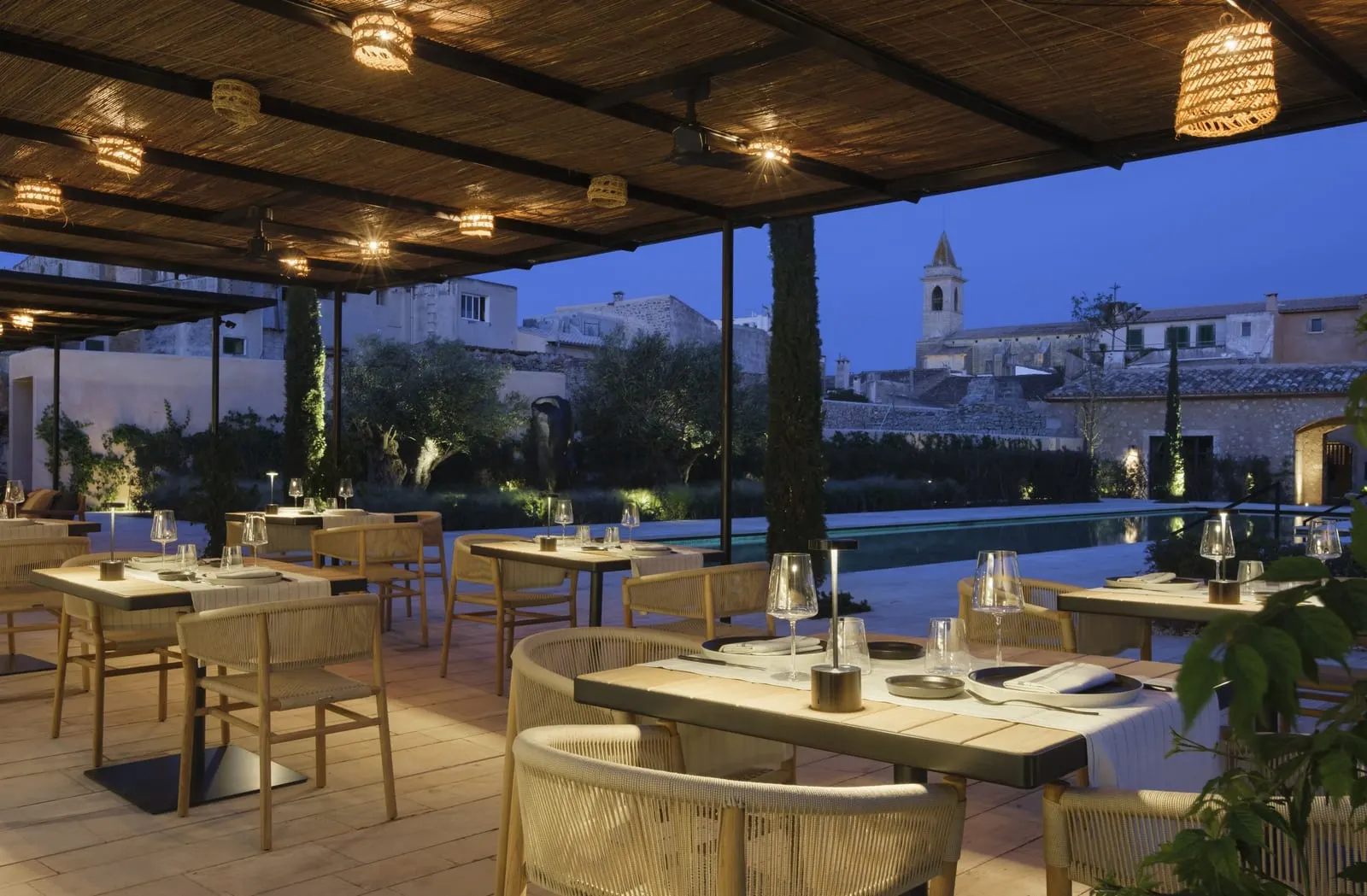 Can Ferrereta: La Fresca by the pool, with Sant Andreu's tower beyond