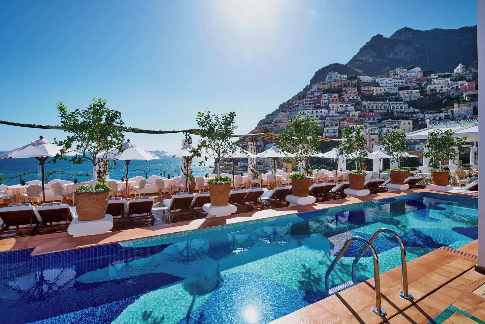 Le Sirenuse: The mosaic pool with Positano rising behind