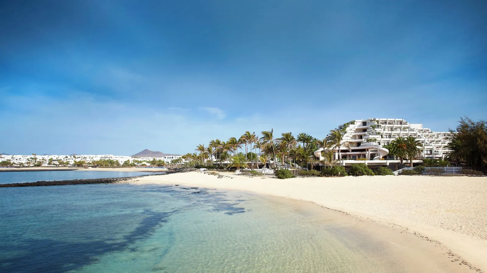 Paradisus Salinas Lanzarote: The stepped building above the Costa Teguise shore