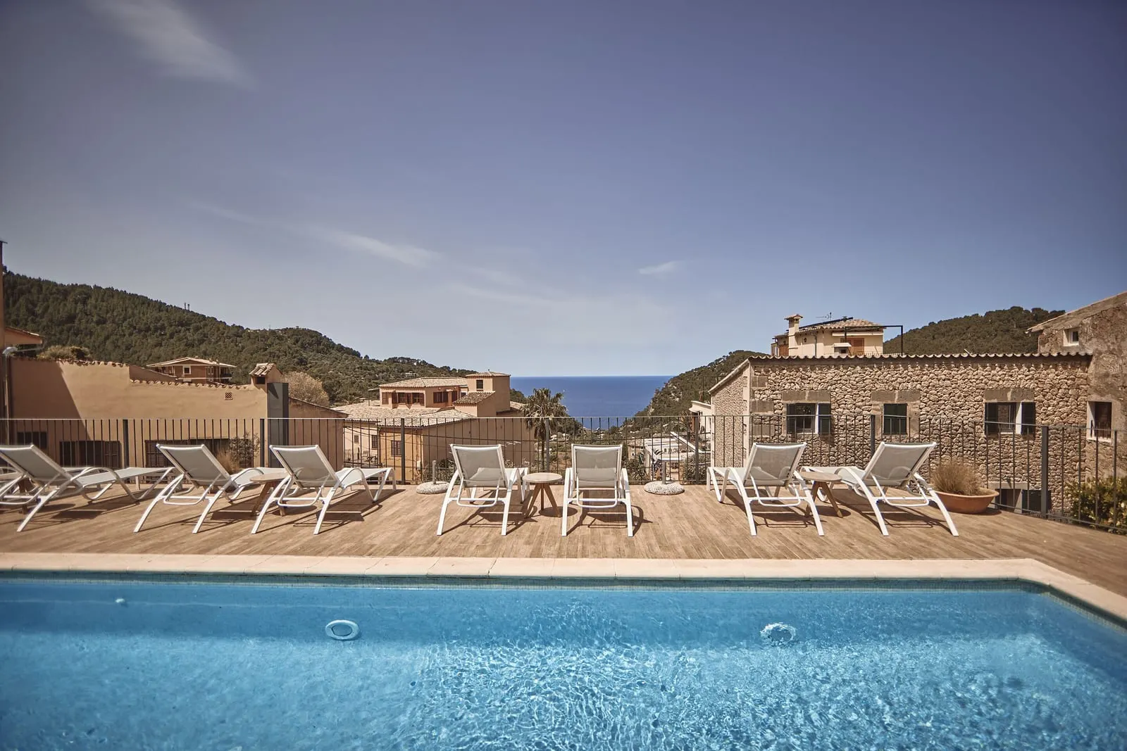 Maristel Hotel & Spa: The outdoor pool and sun deck among the village houses