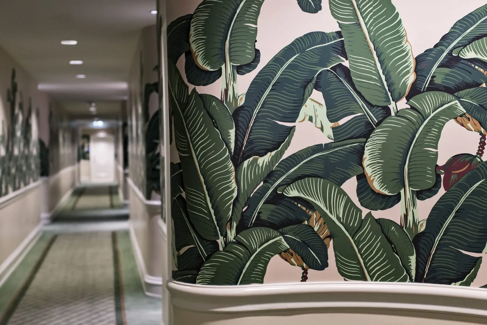 The Beverly Hills Hotel: Martinique banana-leaf wallpaper in a corridor