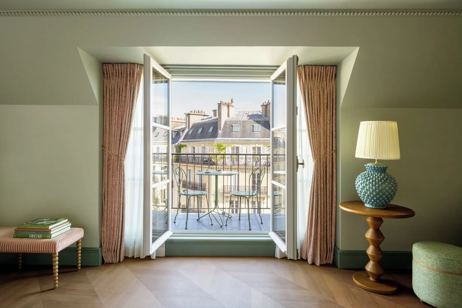 Le Grand Mazarin: A suite balcony facing Paris rooftops