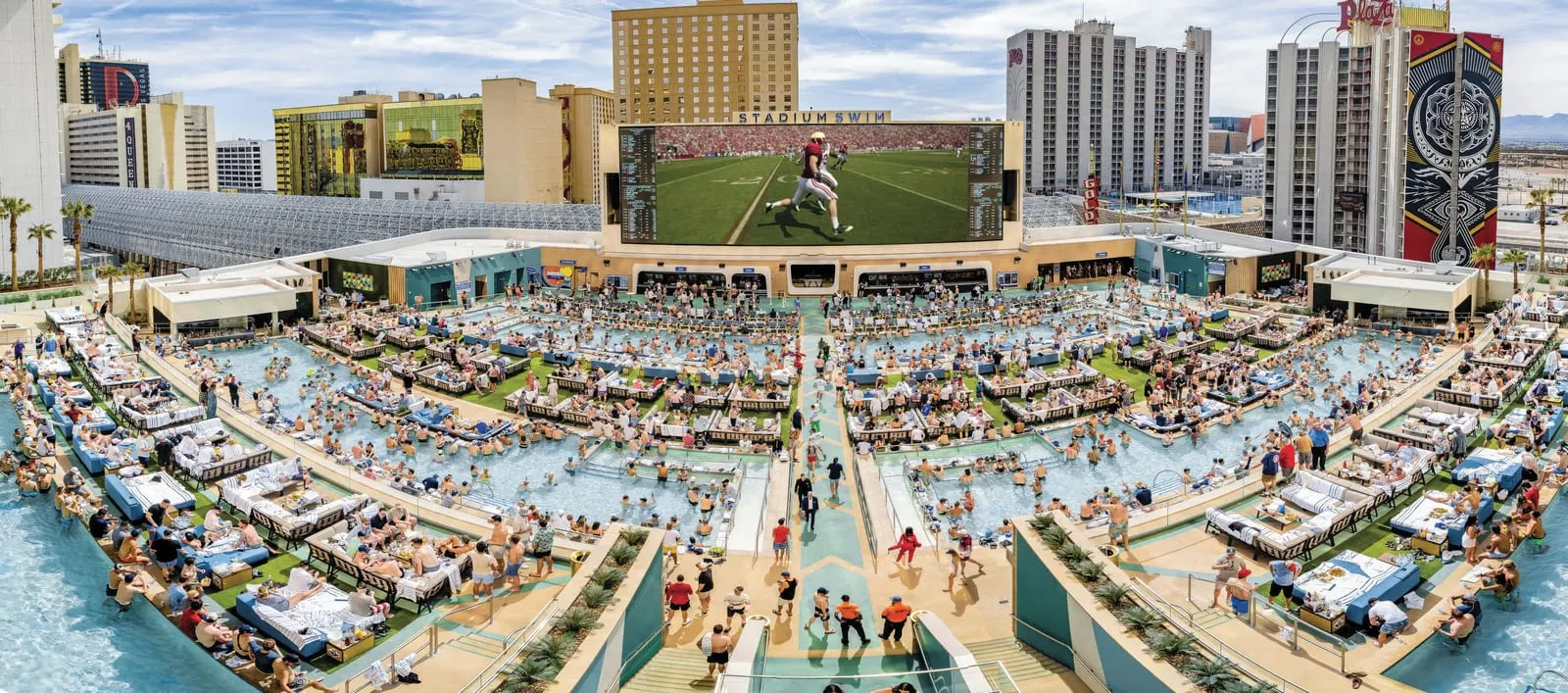 Circa Resort & Casino: Stadium Swim's tiered pools facing the giant screen