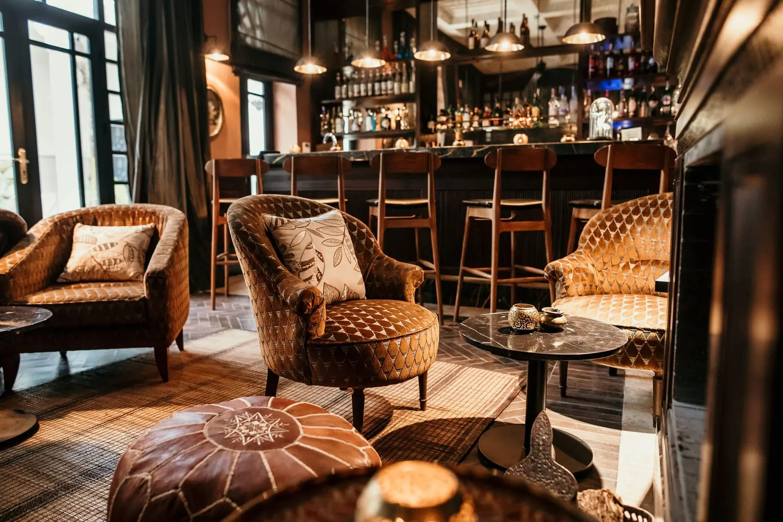 La Villa des Orangers: The bar, with velvet armchairs and leather poufs