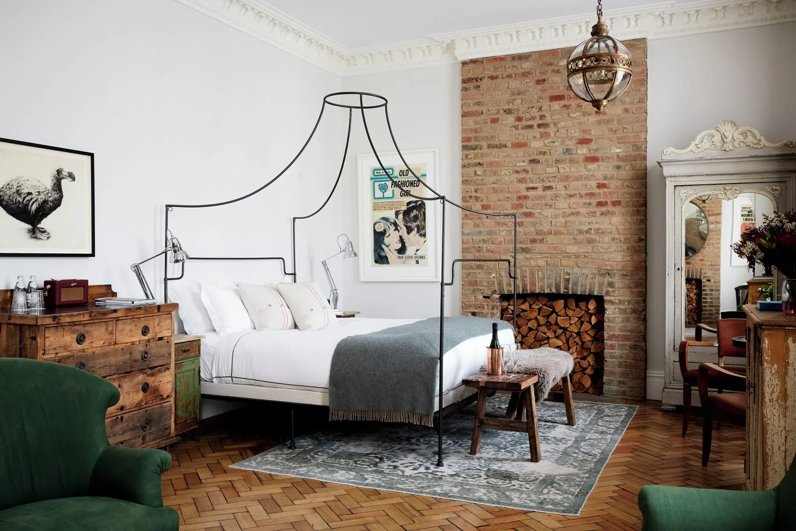 Artist Residence London: A canopy bed against bare brick