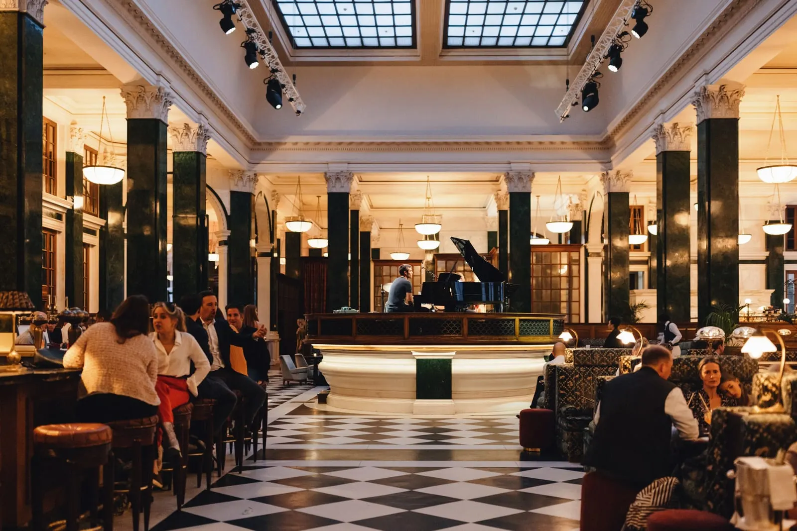 The Ned: Verdigris columns and checkerboard marble