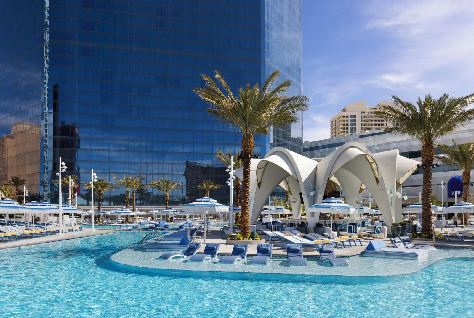 Fontainebleau Las Vegas: The Oasis pool below the blue-glass tower