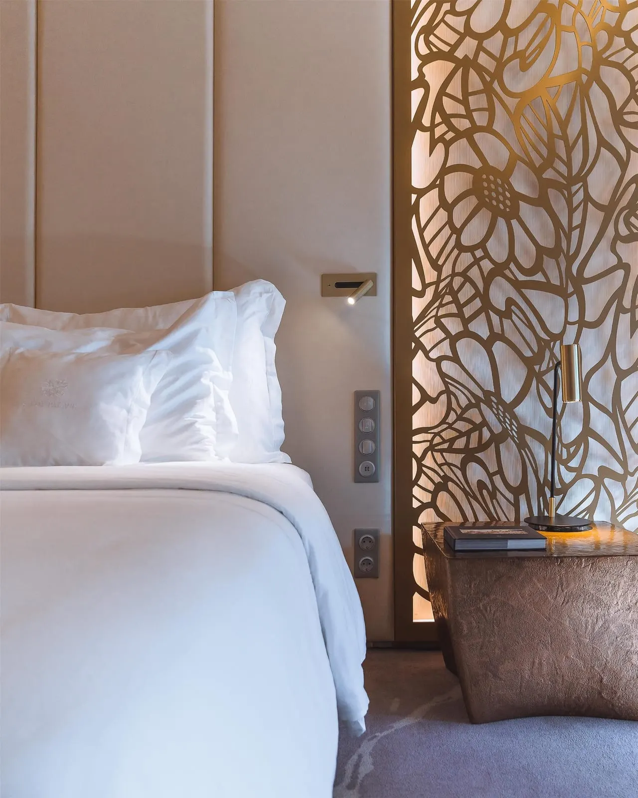 Savoy Palace: The cut-out flower screen beside the bed
