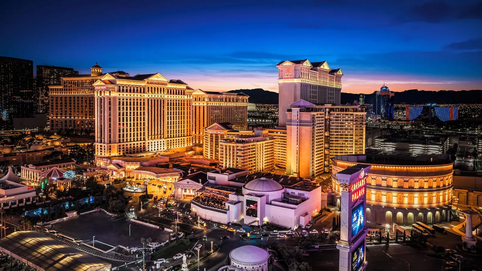 Caesars Palace: Caesars Palace and the Colosseum from above at dusk