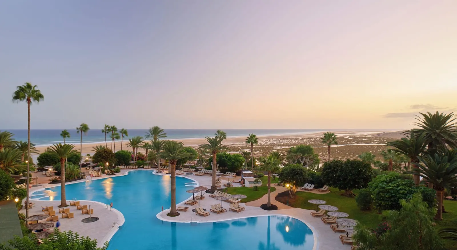 Paradisus by Meliá Fuerteventura: Palm gardens and Sotavento beach at dusk