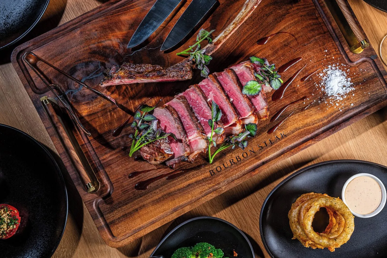 Four Seasons Hotel Las Vegas: A sliced bone-in steak at Bourbon Steak